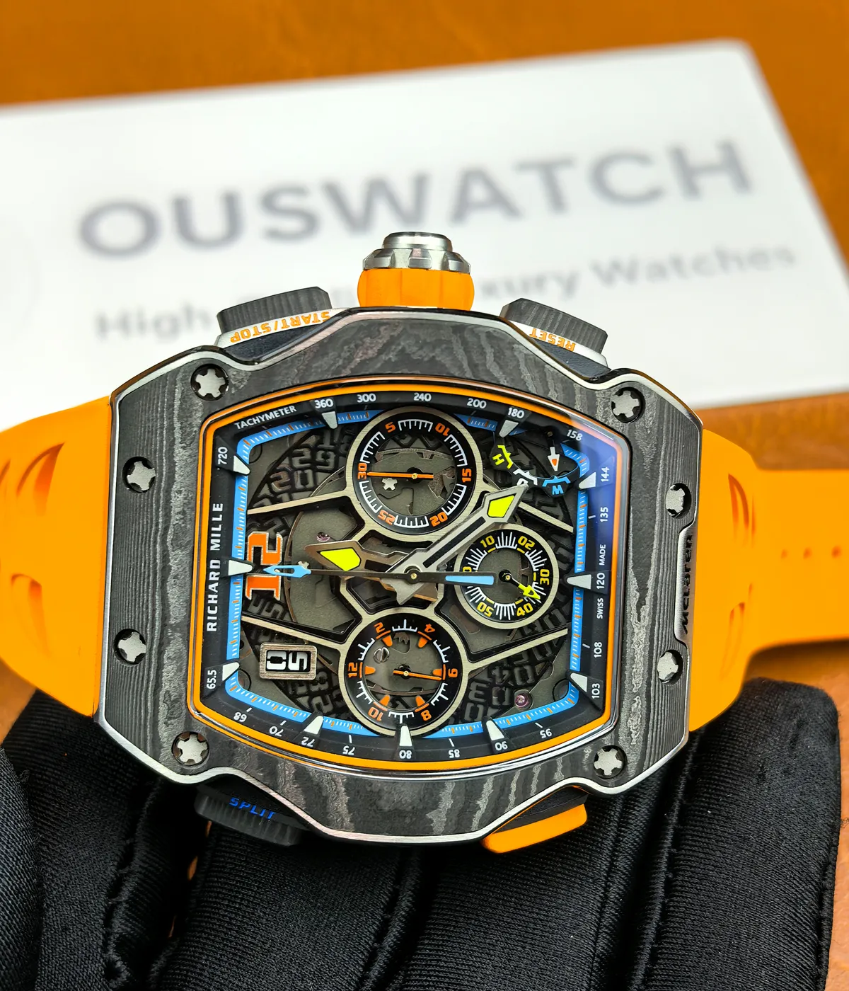 180-degree view of the RM65-01 replica highlighting the dial and full case contour.