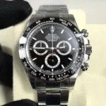 Front view of the Rolex 2025 Daytona Black on Black Ceramic Bezel 126500LN-0002 men's watch with a ceramic bezel and stainless steel Oyster bracelet.