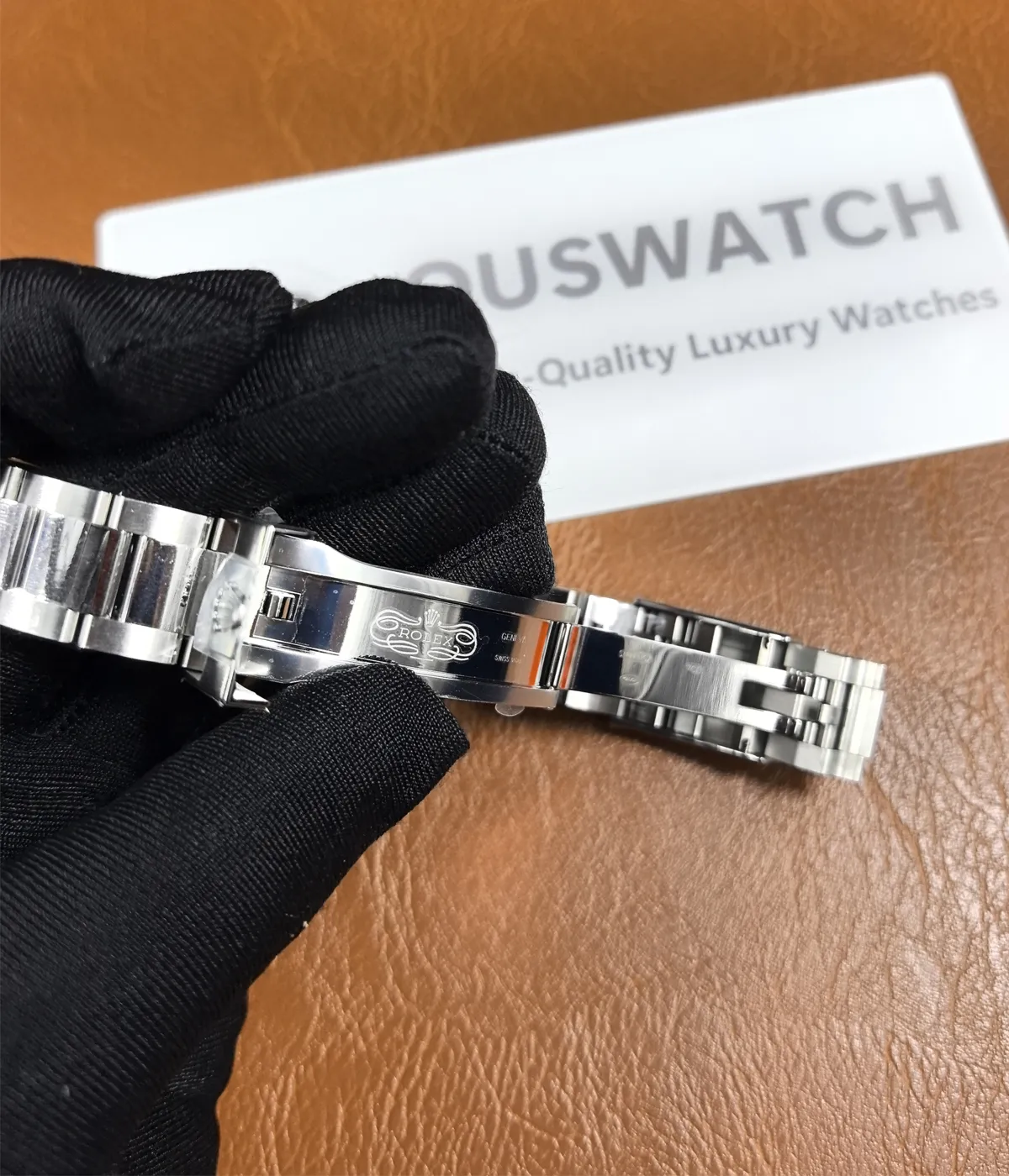 Close-up of the clasp detail on the Rolex 2025 Daytona Black on Black Ceramic Bezel 126500LN-0002 men's watch.