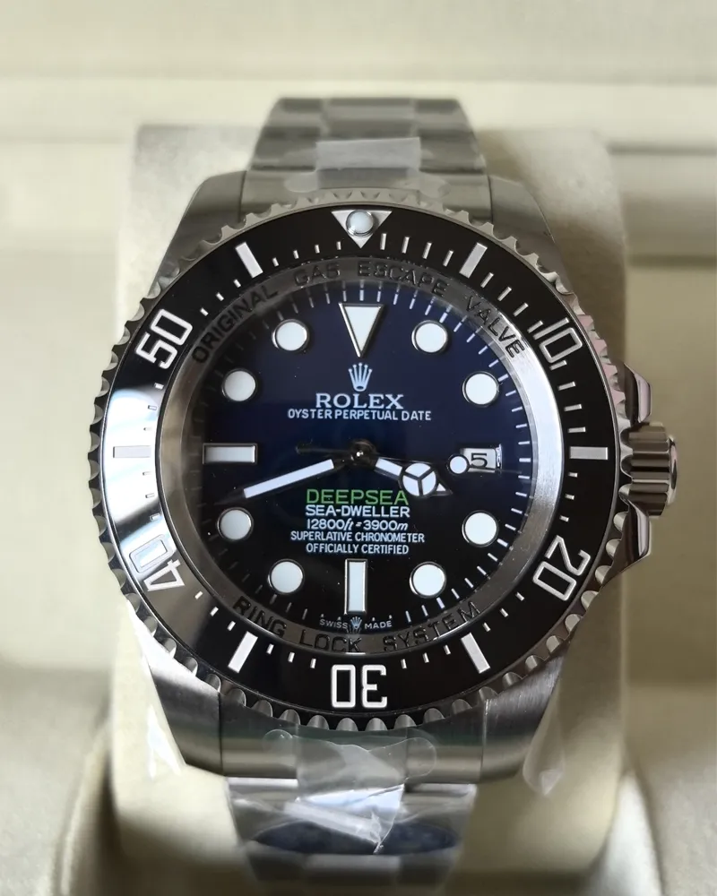 Front view of the Rolex 44MM D-Blue Dial M136660-0005 with a black ceramic bezel and Oyster strap.
