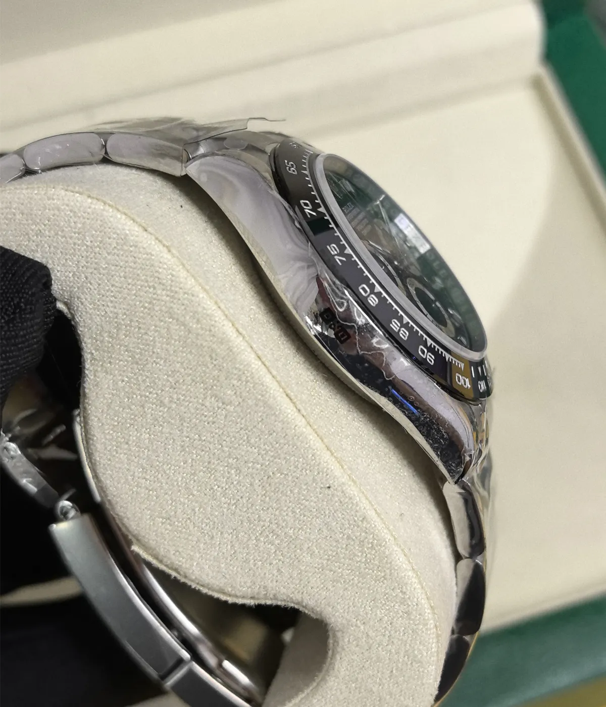 Side view of the Rolex Cosmograph Daytona 116500LN-0002 40mm men's watch, showcasing the satin finish on the case.