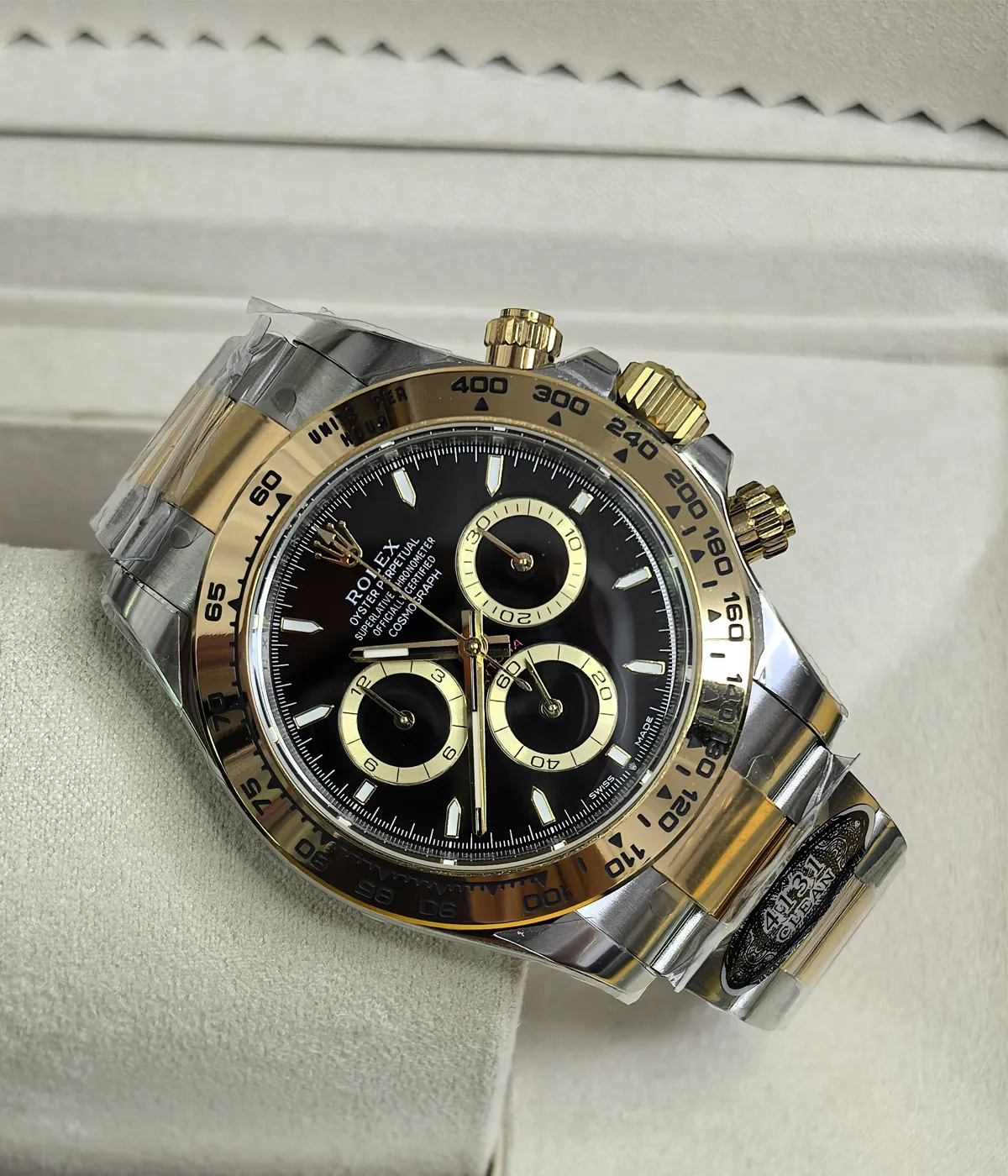 -45-degree angle view of the Rolex Cosmograph Daytona Yellow Rolesor M126503 men's watch with an Oyster bracelet.