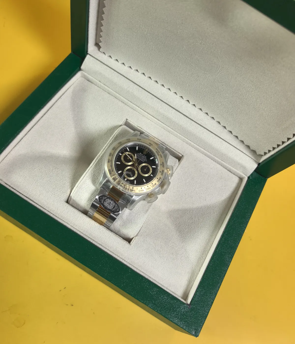 View of the packaging for the Rolex Cosmograph Daytona Yellow Rolesor M126503 men's watch.