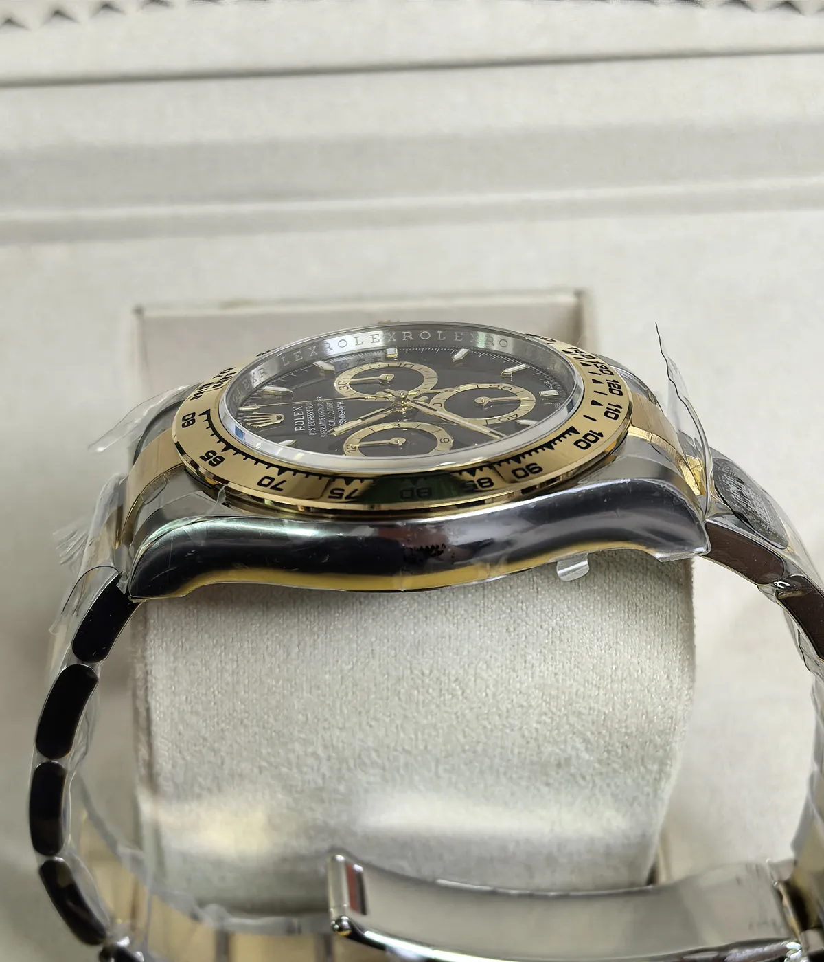 Side view of the Rolex Cosmograph Daytona Yellow Rolesor M126503 men's watch, showcasing its satin finish on the case.