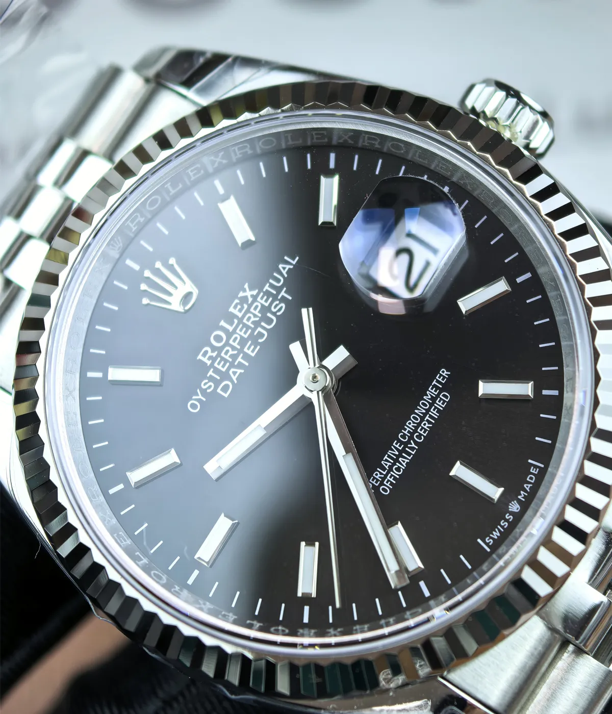 Close-up of the dial details on the Rolex Datejust 36mm M126234-0015 with a black dial and two-tone case.