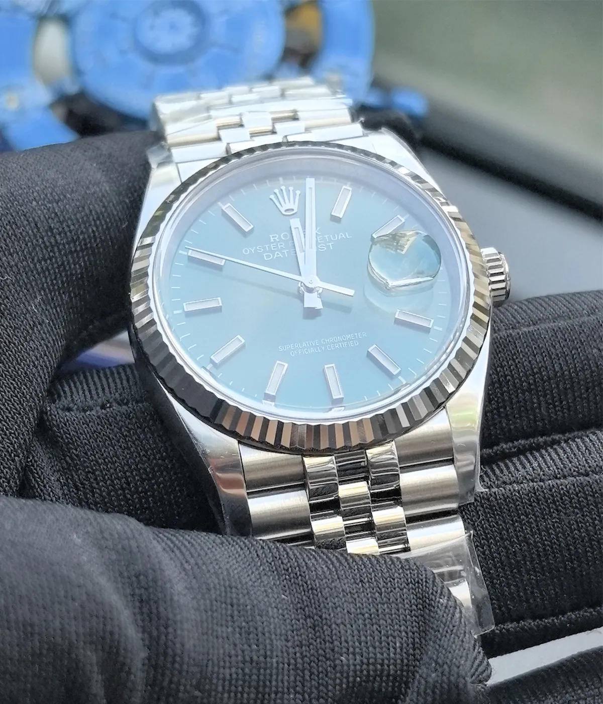 -15-degree angle view of the Rolex Datejust 36mm M126234-0051 with a mint olive green dial, two-tone case, and Oyster strap.