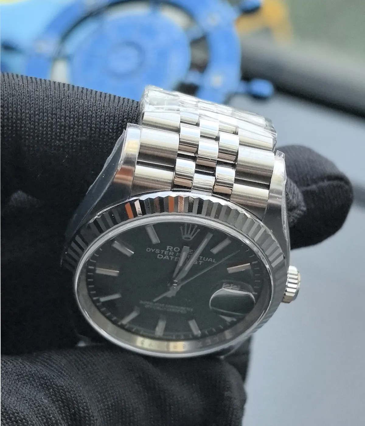 Close-up view of the lugs on the Rolex Datejust 36mm M126234-0051 with a mint olive green dial and two-tone case.