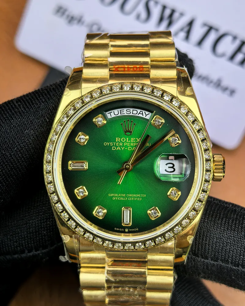 Front view of the Rolex Day-Date M128348RBR-0035 with a green dial, gold Oyster strap, and diamond bezel for women.