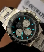 Luminous display of the black dial on the Rolex Daytona Le Mans 126529LN White Gold men's watch, showing the dial and hands glowing in the dark.