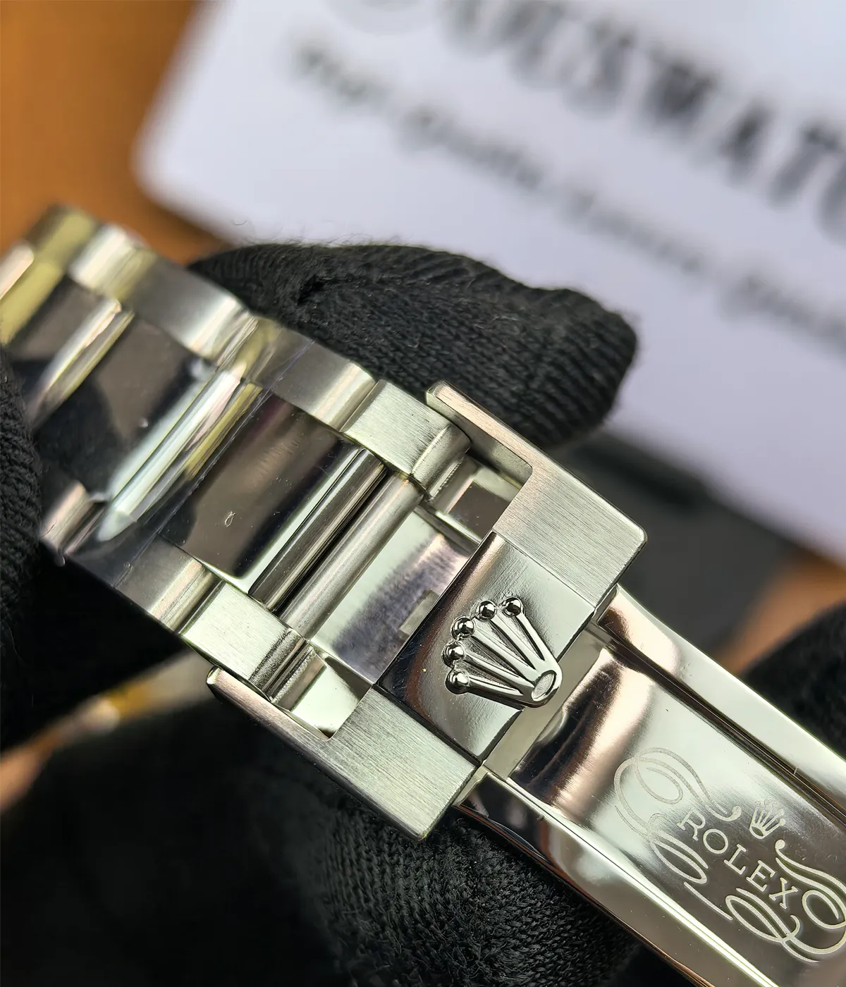Detailed close-up of the clasp on the Rolex Daytona Le Mans 126529LN White Gold men's watch.