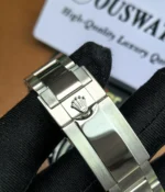 Close-up view of the clasp on the Rolex Daytona Le Mans 126529LN White Gold men's watch.