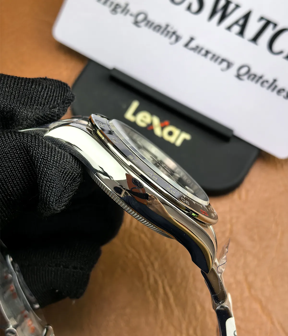 Side view of the Rolex Daytona Le Mans 126529LN White Gold men's watch, showcasing the satin finish on the case.