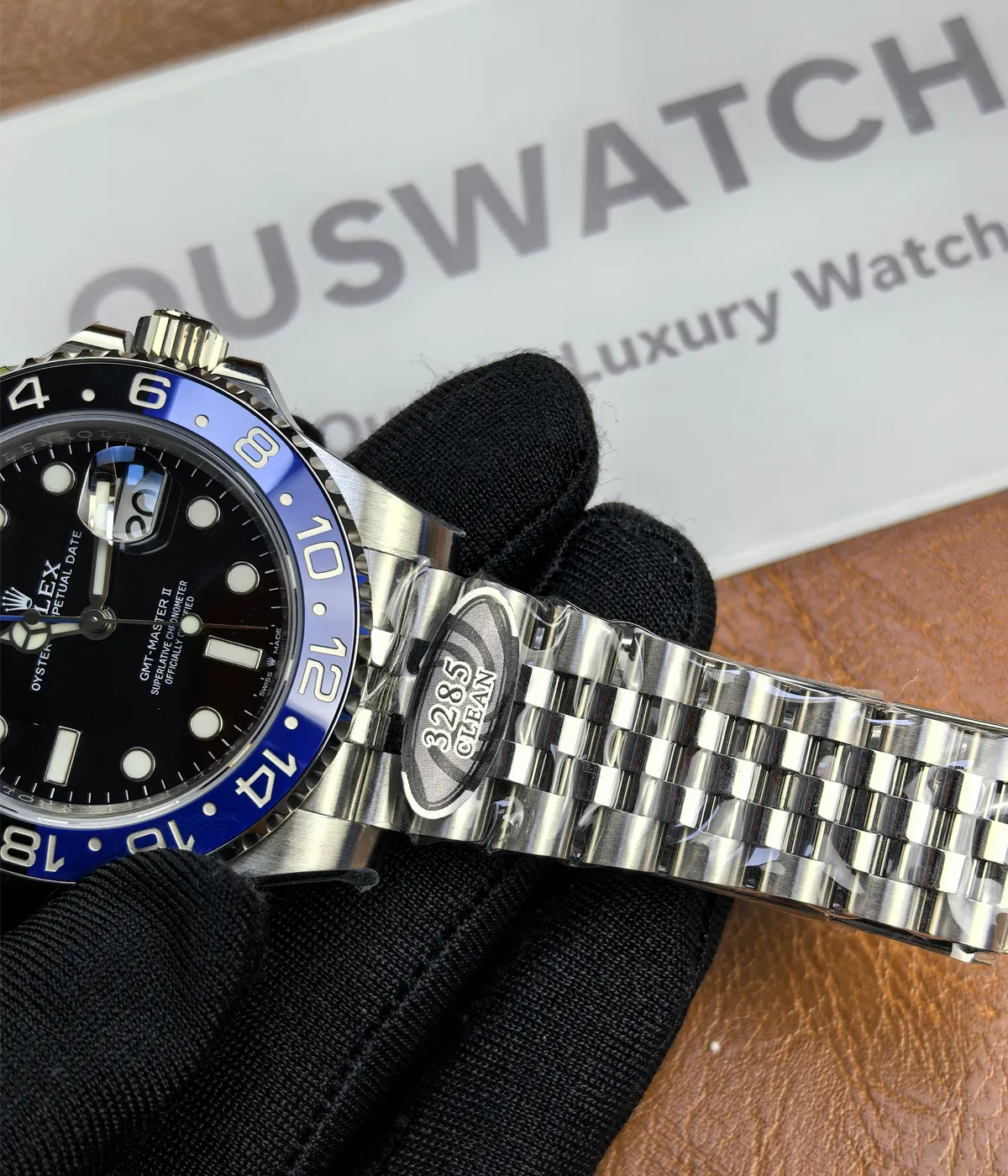 Full view of the bracelet on the Rolex GMT-Master Blue M126710BLNR-0002 with a black dial and Oystersteel case.