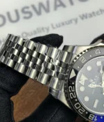 Close-up of the lugs on the Rolex GMT-Master Blue M126710BLNR-0002 with a black dial and Oystersteel case.