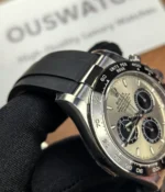 Close-up of the lugs on the Rolex Ghost Oysterflex Daytona 126519LN with an 18K white gold case and silver dial.