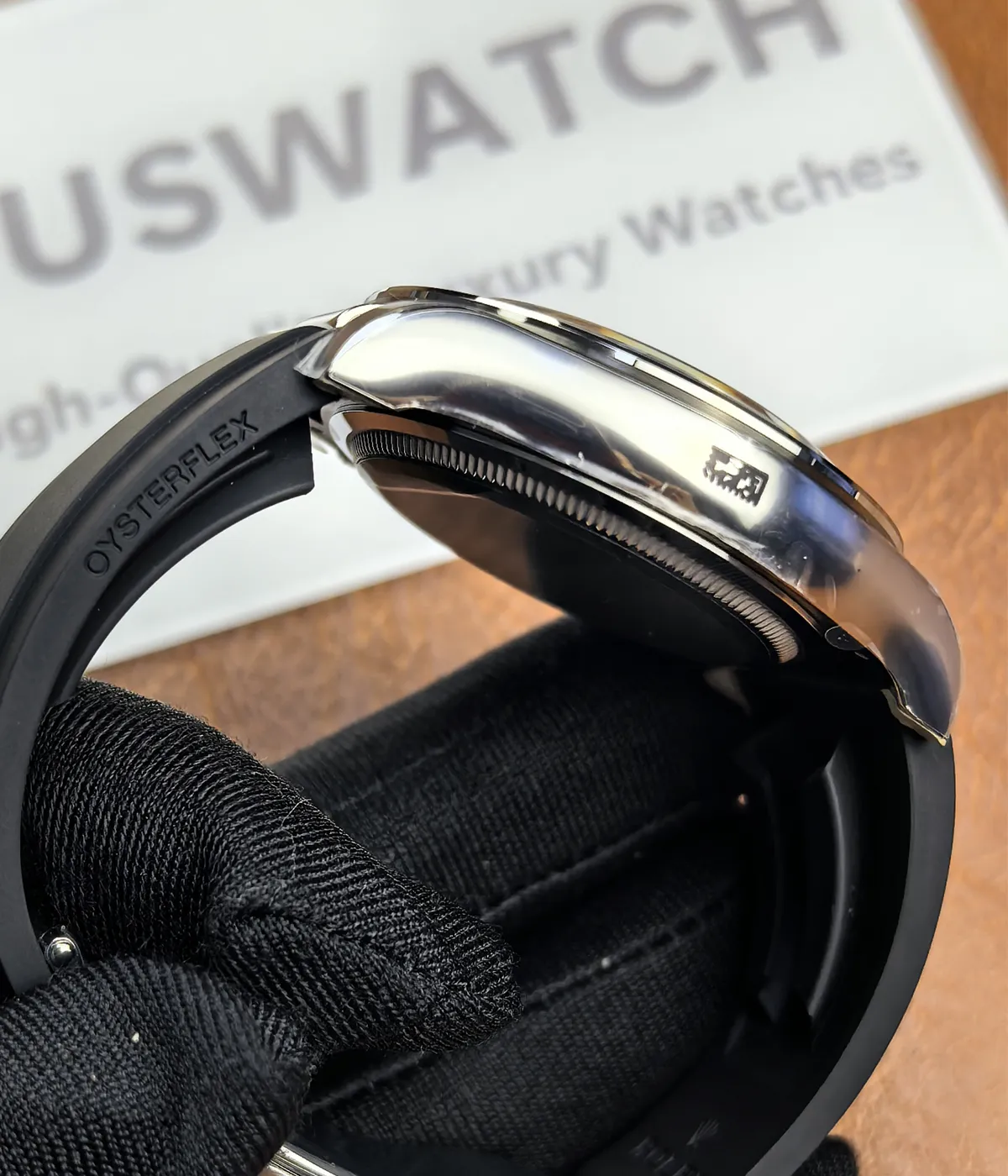 ide view of the Rolex Ghost Oysterflex Daytona 126519LN with satin finish on the case.