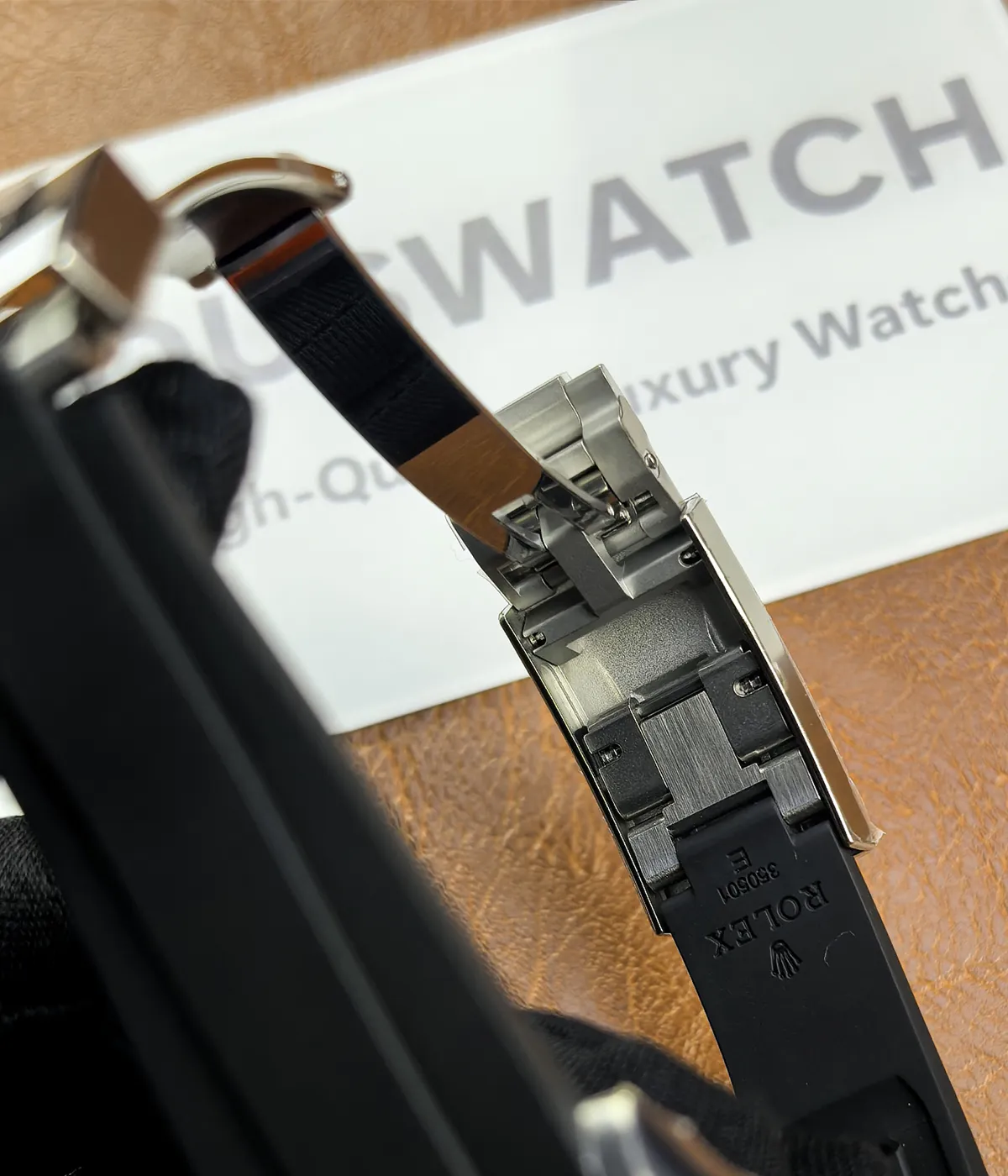 Detailed close-up of the clasp on the Rolex Ghost Oysterflex Daytona 126519LN.