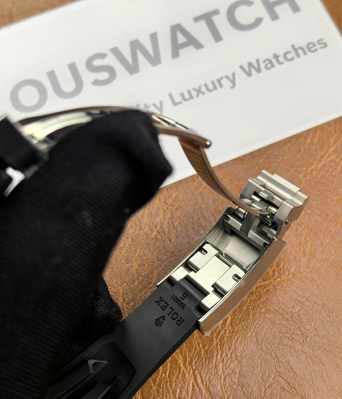 Close-up of the clasp and inner bracelet detail on the Rolex Ghost Oysterflex Daytona 126519LN.