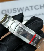 Close-up of the clasp on the Rolex M276200-0006 28mm with a blue dial and Oyster steel strap.