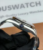 Close-up of the crown on the Rolex M276200-0006 28mm with a blue dial and Oyster steel strap.