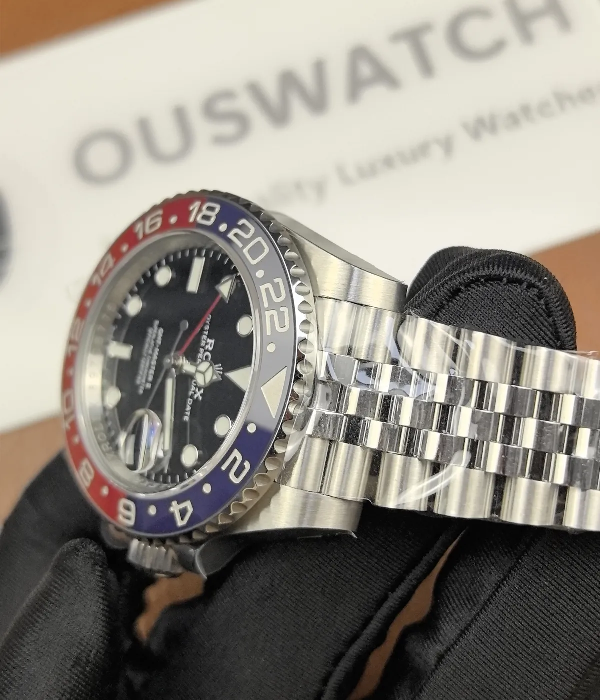 Full view of the bracelet on the Rolex Pepsi GMT-Master II M126719BLRO-0001 with a black dial and white gold case.