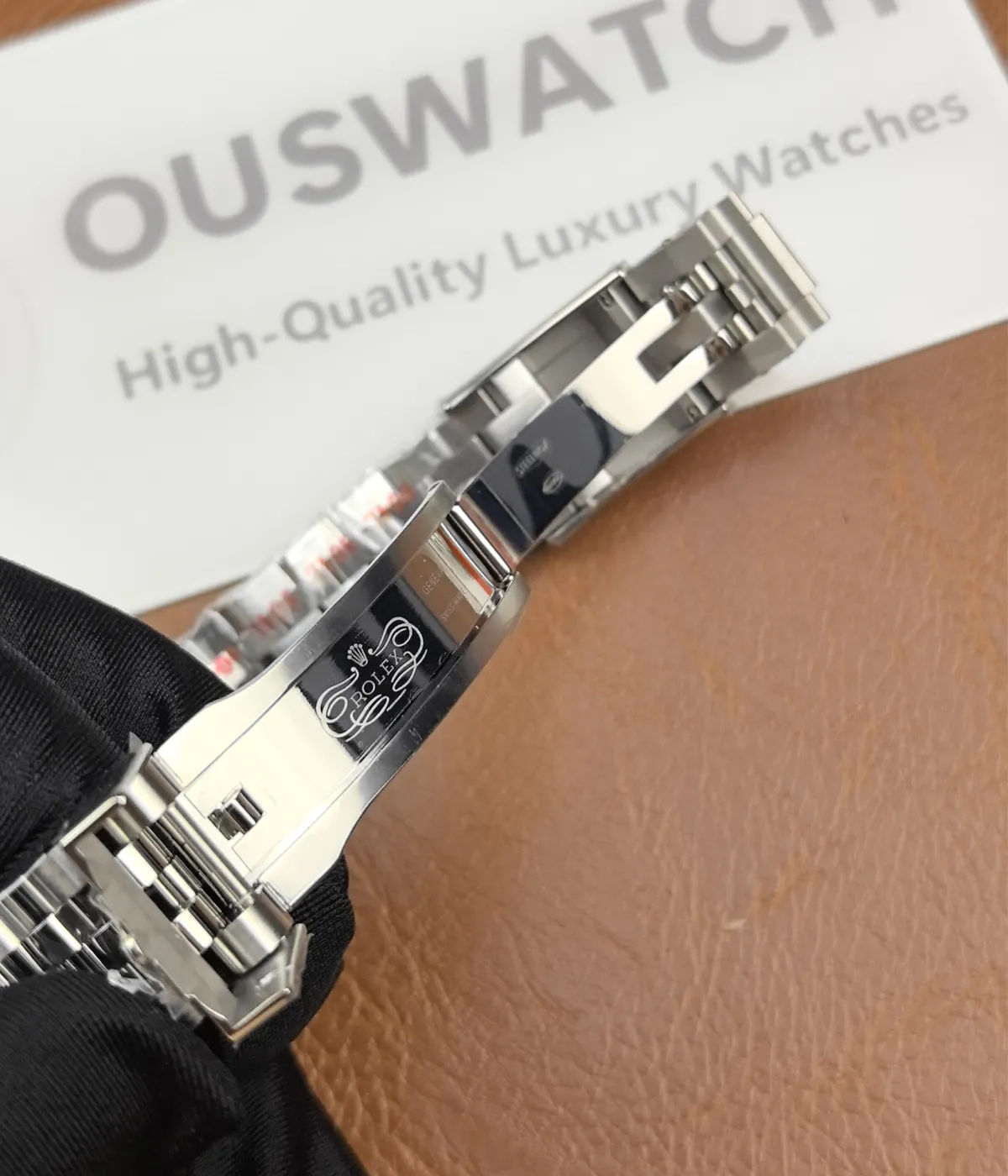 Detailed close-up of the clasp on the Rolex Pepsi GMT-Master II M126719BLRO-0001 with a black dial and white gold case.