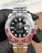 Front view of the Rolex Pepsi GMT-Master II M126719BLRO-0001 with a black dial and white gold case.