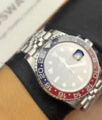 The Rolex Pepsi GMT-Master II M126719BLRO-0001 with a black dial and white gold case being worn on the wrist.