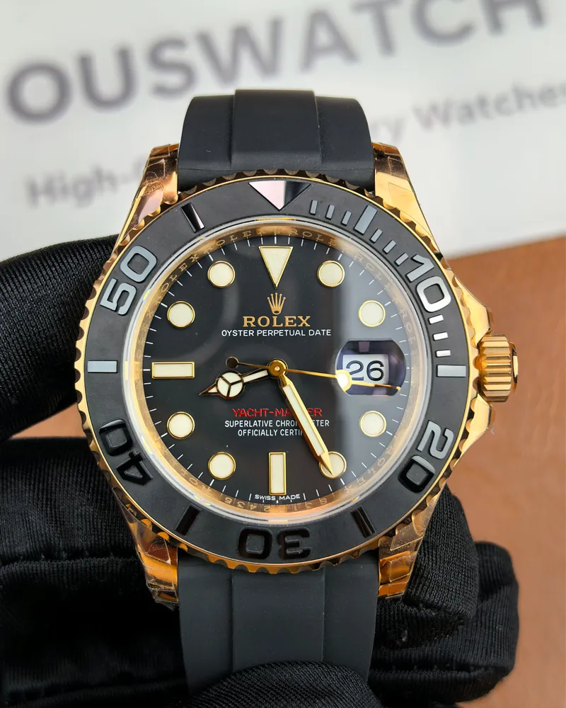 Front view of the Rolex Rose Gold Yachtmaster 126655-0002 with a 40MM black dial, rubber strap, and rose gold case.