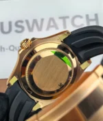 View of the caseback on the Rolex Rose Gold Yachtmaster 126655-0002 with a black dial and rubber strap.