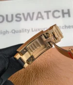 Detailed close-up of the clasp on the Rolex Rose Gold Yachtmaster 126655-0002 with a black dial and rubber strap.