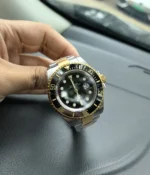 -25-degree angle view of the Rolex Sea Dweller M126603-0001 with a black dial and Oystersteel and yellow gold two-tone case.