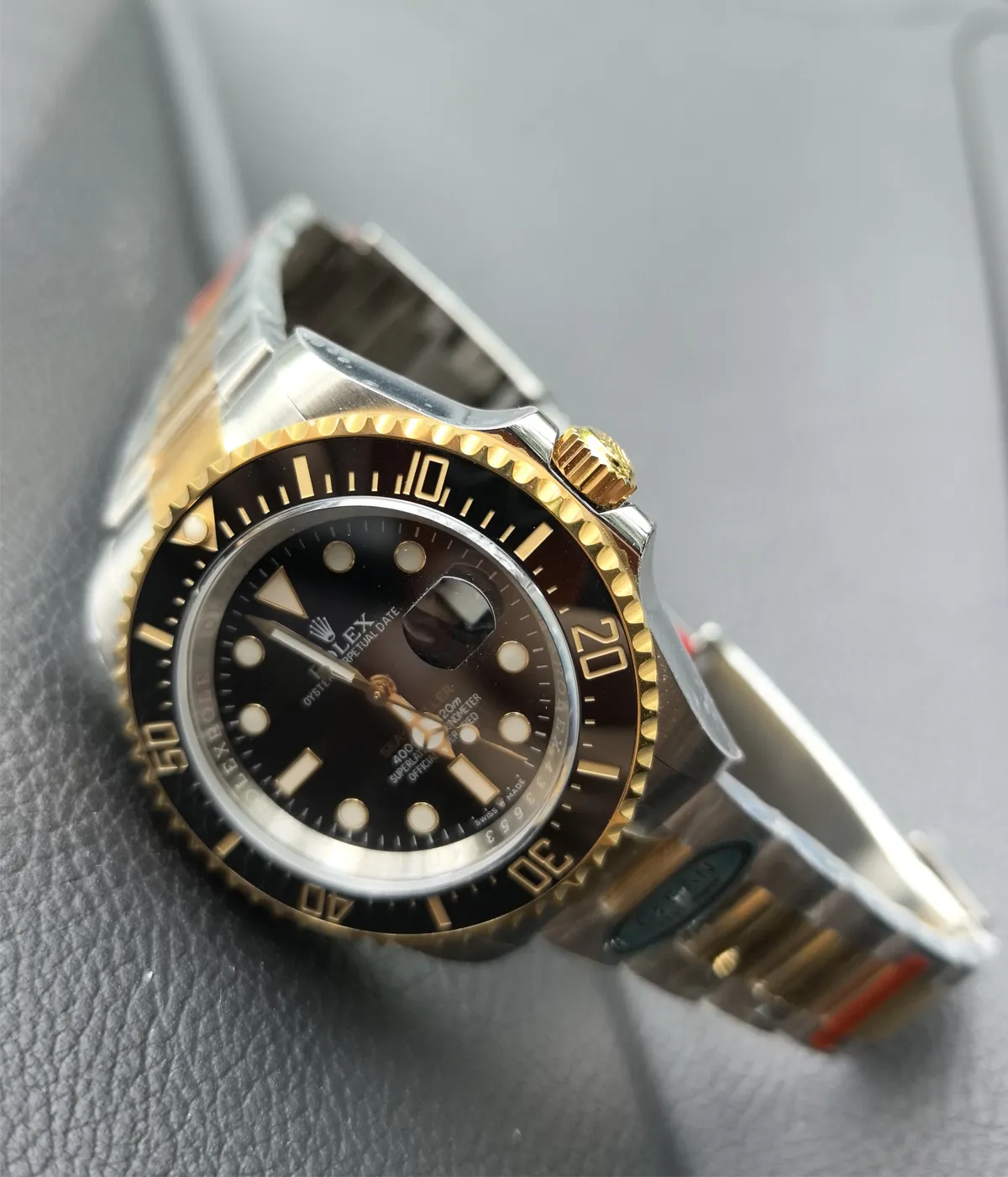 -45-degree angle view of the Rolex Sea Dweller M126603-0001 with a 43MM Oystersteel and yellow gold two-tone case and black dial.