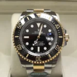Front view of the Rolex Sea Dweller M126603-0001 with a 43MM Oystersteel and yellow gold two-tone case and black dial.