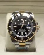 Front view of the Rolex Sea Dweller M126603-0001 with a 43MM Oystersteel and yellow gold two-tone case and black dial.