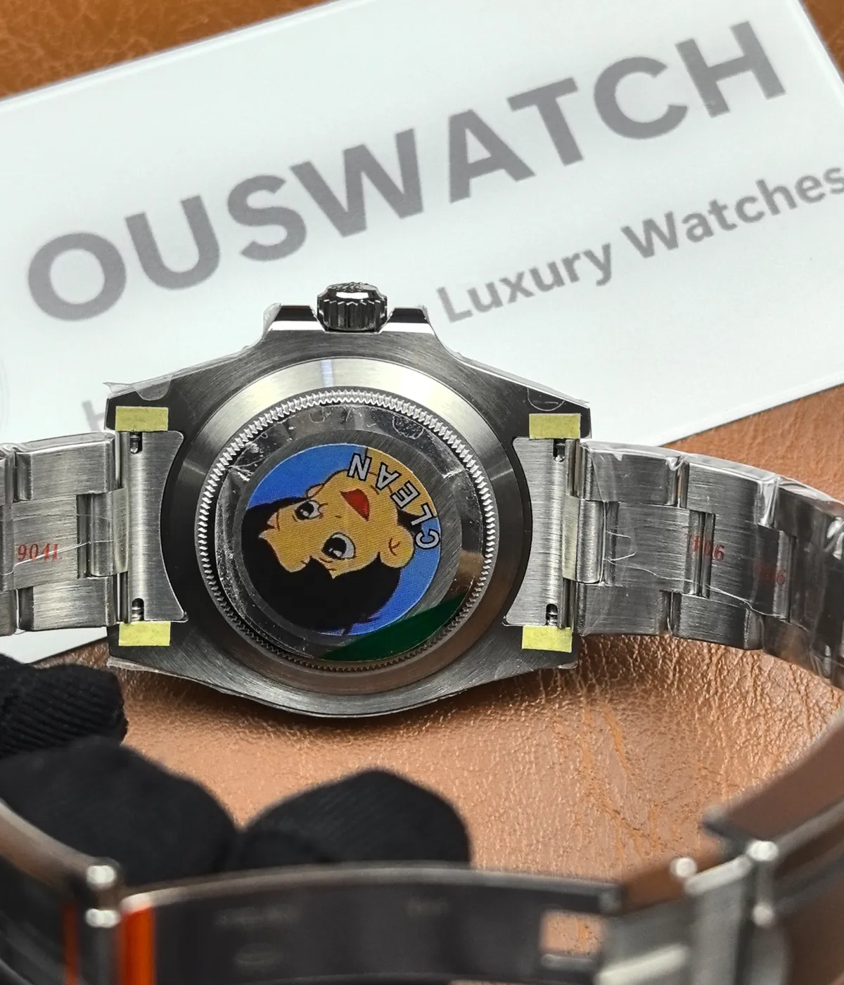 View of the caseback on the Rolex Submariner Date 116610LV-0002 with a 40MM green dial and Oystersteel case.