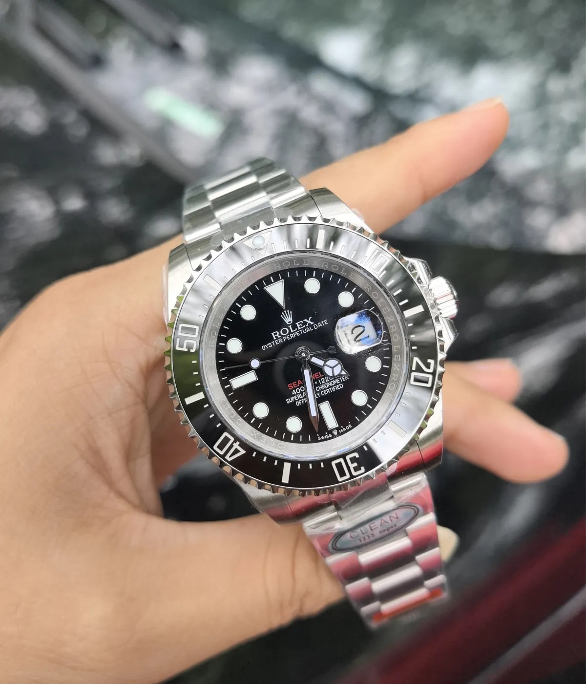 -25-degree angle view of the Rolex Submariner Date 126610LN 41MM with a black dial, ceramic bezel, and Oystersteel case.