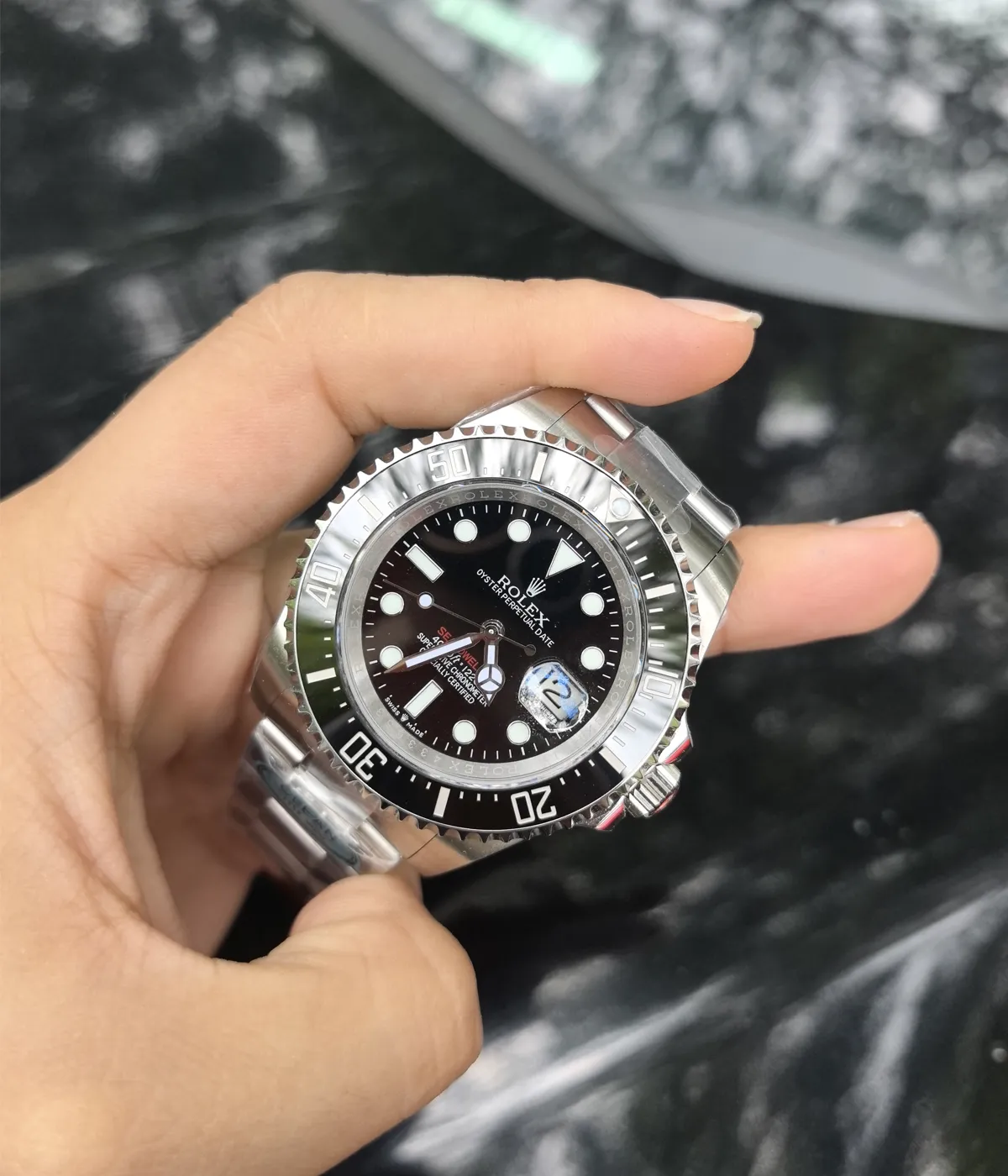 45-degree angle view of the Rolex Submariner Date 126610LN 41MM with a black dial, ceramic bezel, and Oystersteel case.