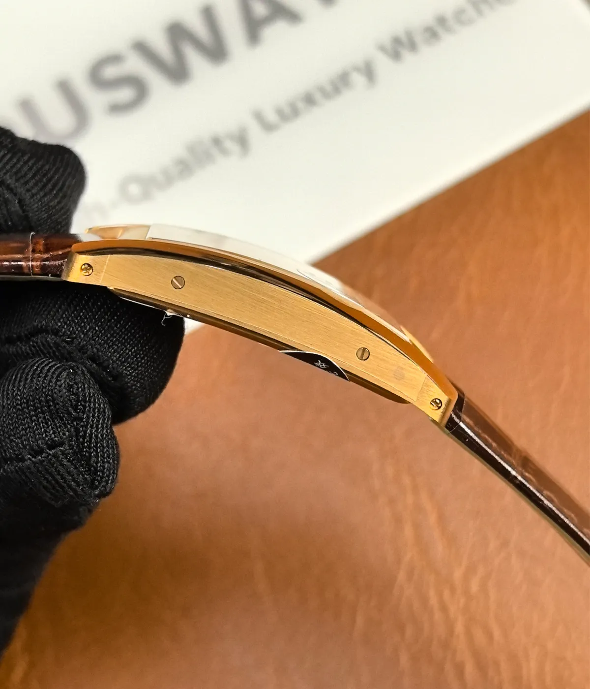 Side view of the Tank Louis Cartier Gold Women's Replica Watch, showcasing the satin finish on the case.