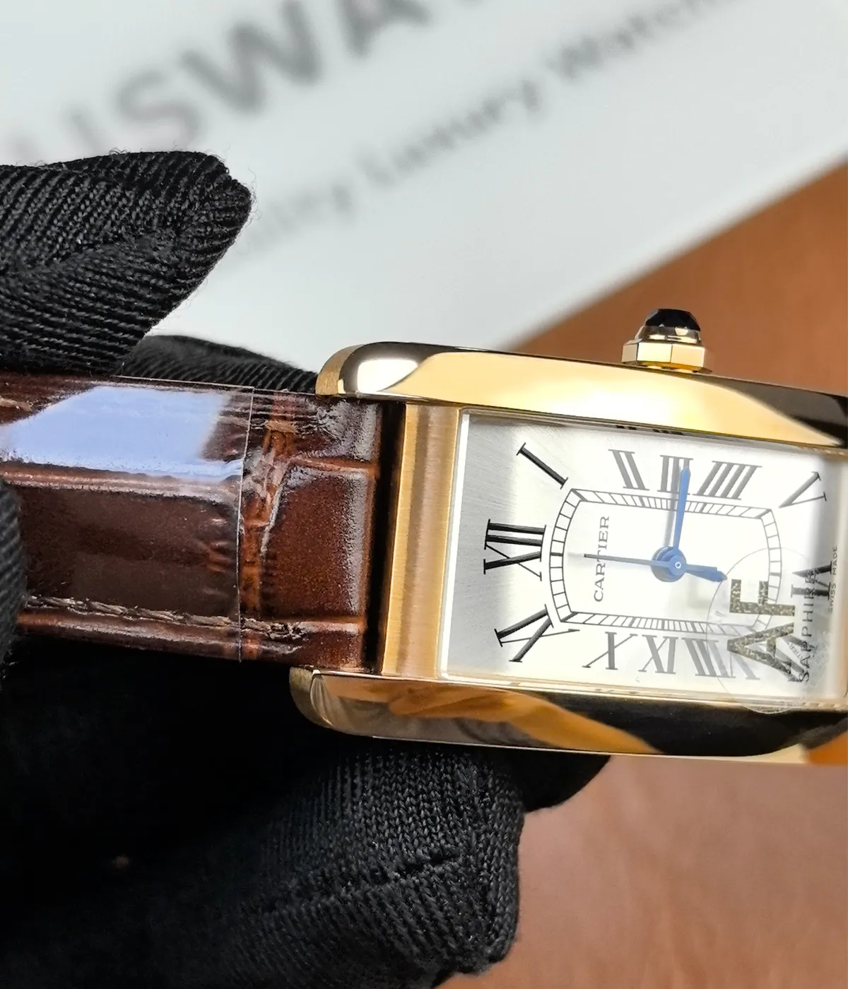 Close-up of the lugs on the Tank Louis Cartier White Dial Gold Women's Replica Watch.