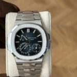 Front view of the Patek Philippe Nautilus 5712-1A featuring a steel case and blue luminous dial.