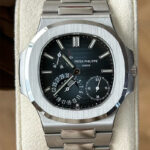 Front view of the Patek Philippe Nautilus 5712-1A featuring a steel case and blue luminous dial.