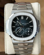Front view of the Patek Philippe Nautilus 5712-1A featuring a steel case and blue luminous dial.