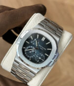 45-degree angled view of the Patek Philippe Nautilus 5712-1A steel blue luminous dial watch.