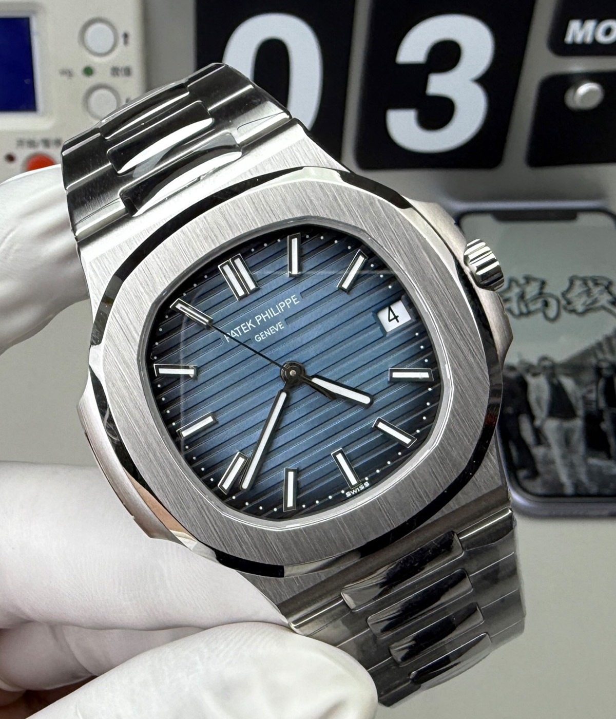 45-degree angle view of Patek Philippe Nautilus 5711-1A-010 blue dial stainless steel replica watch.