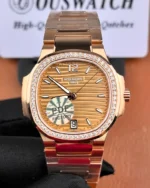 Patek Philippe Nautilus 7118R-001 replica watch in rose gold with diamond-set bezel, front view