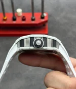 Close-up view of Richard Mille RM 21-01 Tourbillon replica watch crown and case side detail