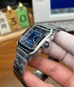 Close-up of Cartier Santos WSSA0030 crown and case detail