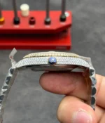 Close-up of the crown on Rolex Datejust 278384RBR-0038 31mm Diamond-set women’s replica watch