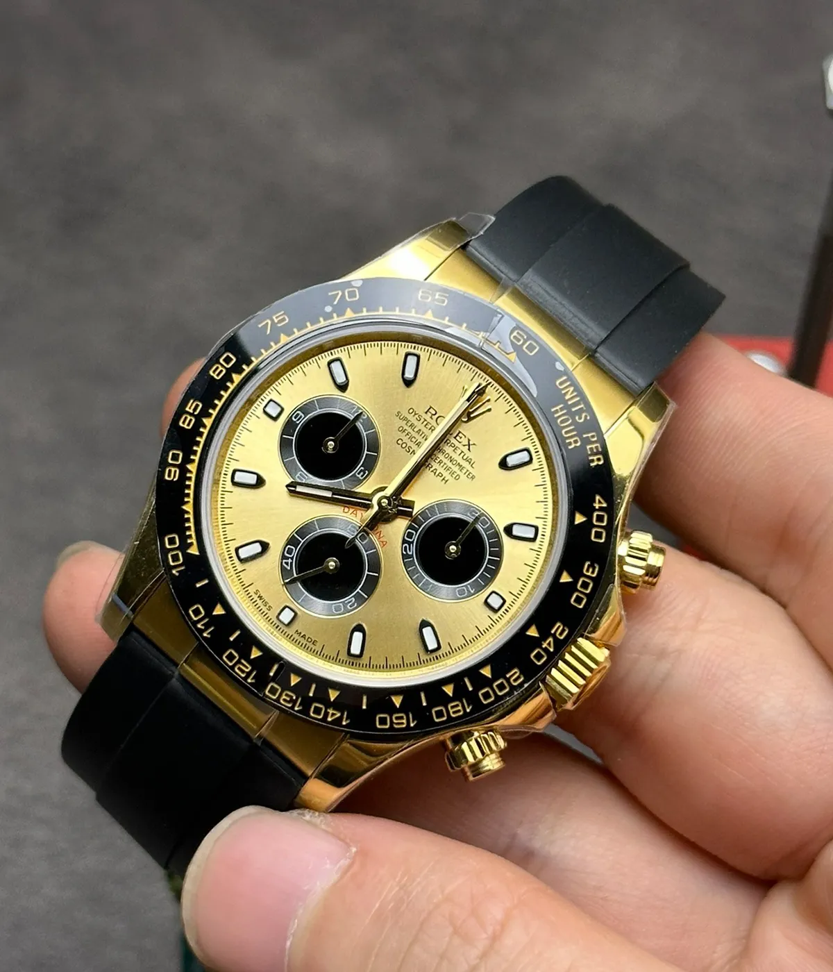 45-degree angled view of the Rolex Cosmograph Daytona M116518LN-0048 replica with champagne dial and black sub-dials